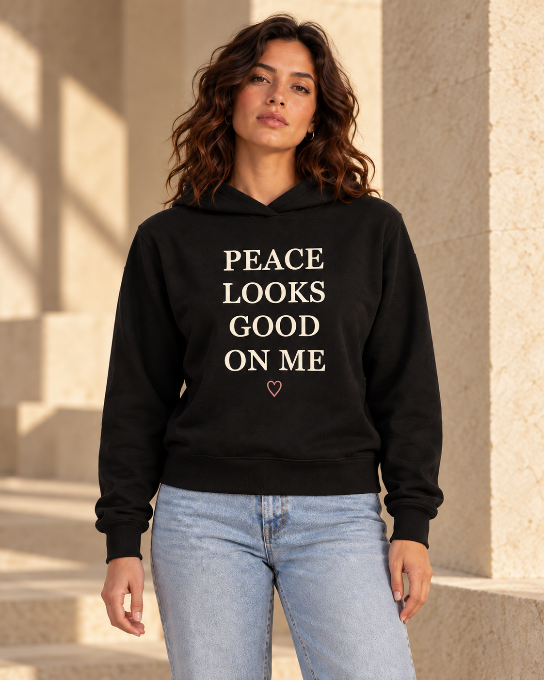 Digital design visualization of a woman wearing CALLED FORM Peace Looks Good Hoodie in Black, showing the front artwork.
