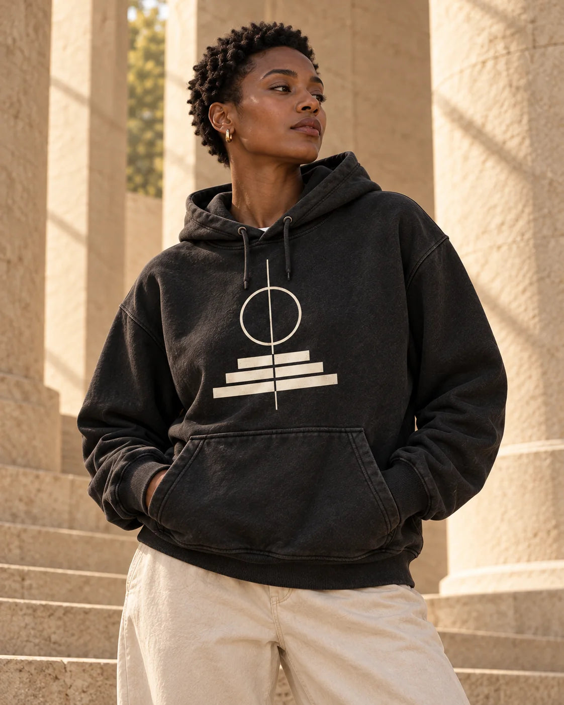 Model wearing Foundation Hoodie 001 in its launch color