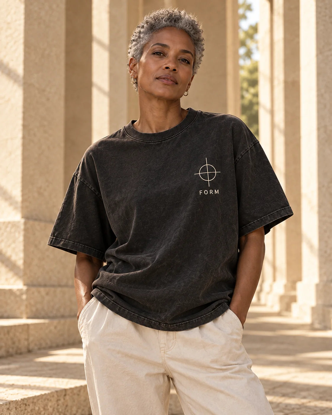Model wearing the FORM Essential Tee 001 in Washed Black